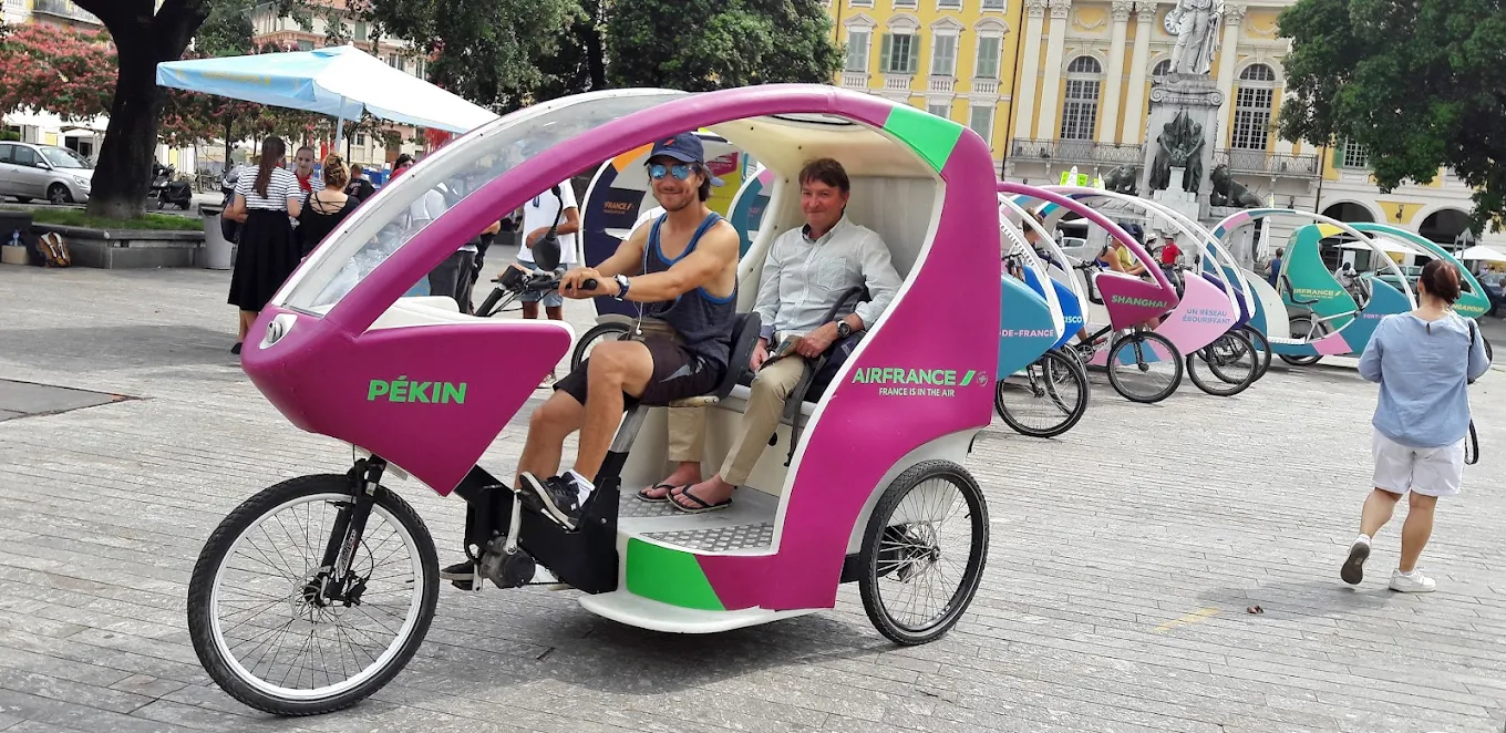 street marketing Ironman Nice 2026 vélotaxi activation terrain